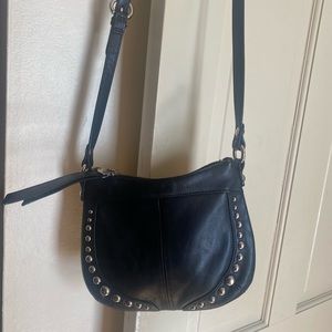 Black Genuine Leather cross body bag.